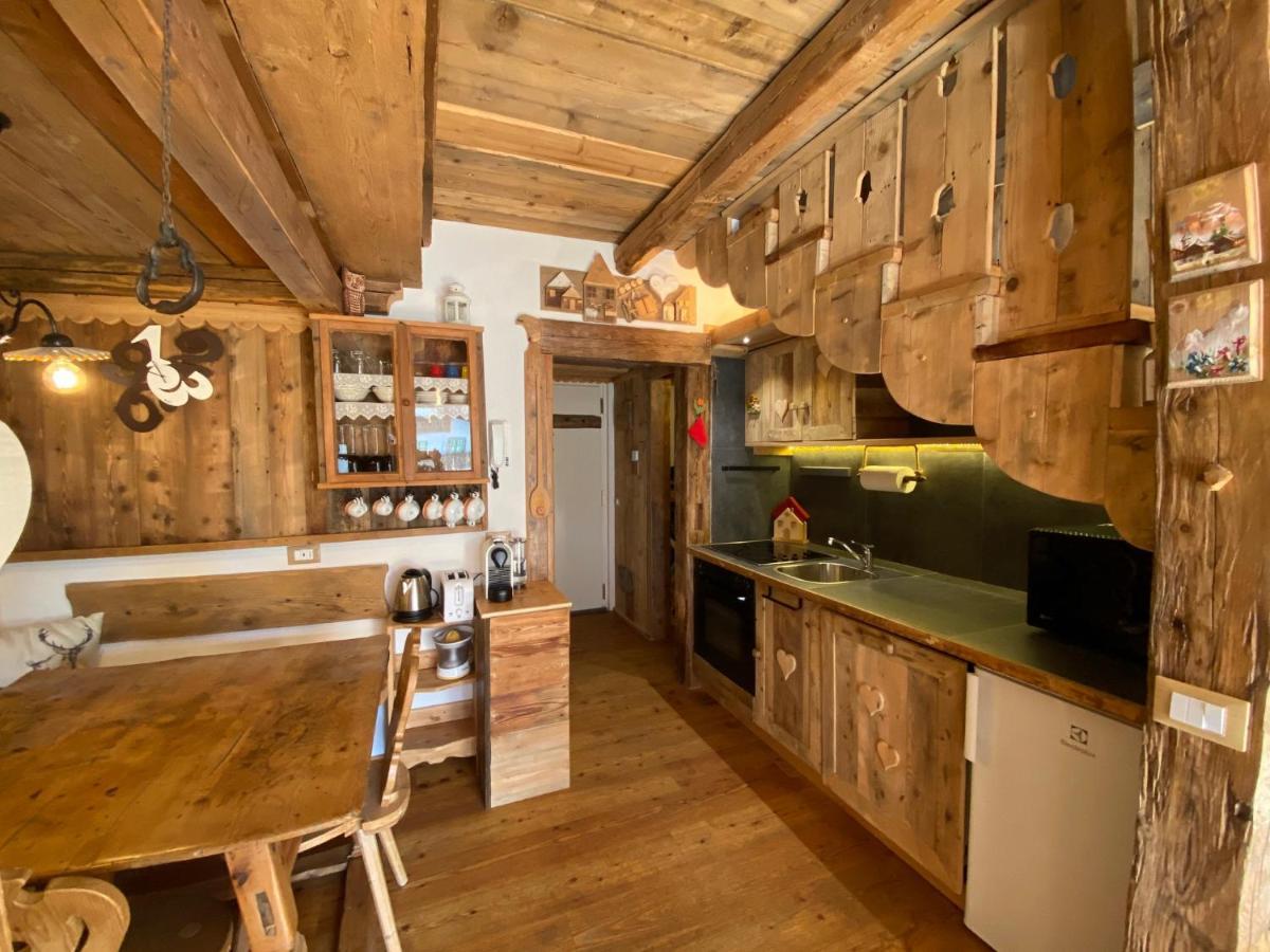 Calore Di Una Casa Di Montagna Campitello di Fassa Bagian luar foto