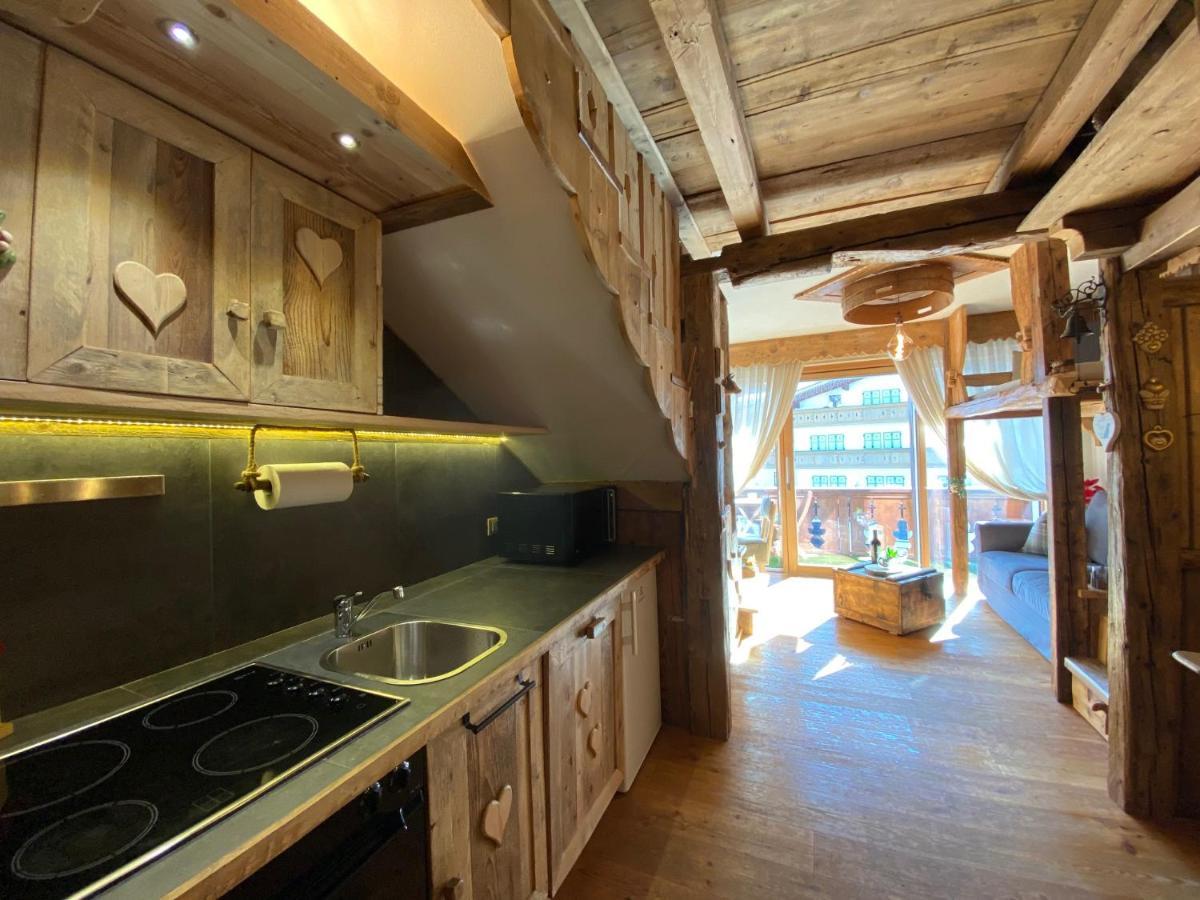 Calore Di Una Casa Di Montagna Campitello di Fassa Bagian luar foto